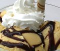 chocolate syrup on vanilla ice cream